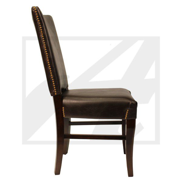 A classic brown leather dining chair with nailhead trim and sturdy wooden legs.