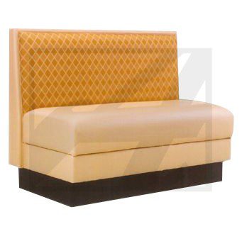 Modern beige booth seating with a tufted backrest and dark base.