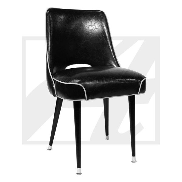 Sleek black leather dining chair with tapered legs and white piping.