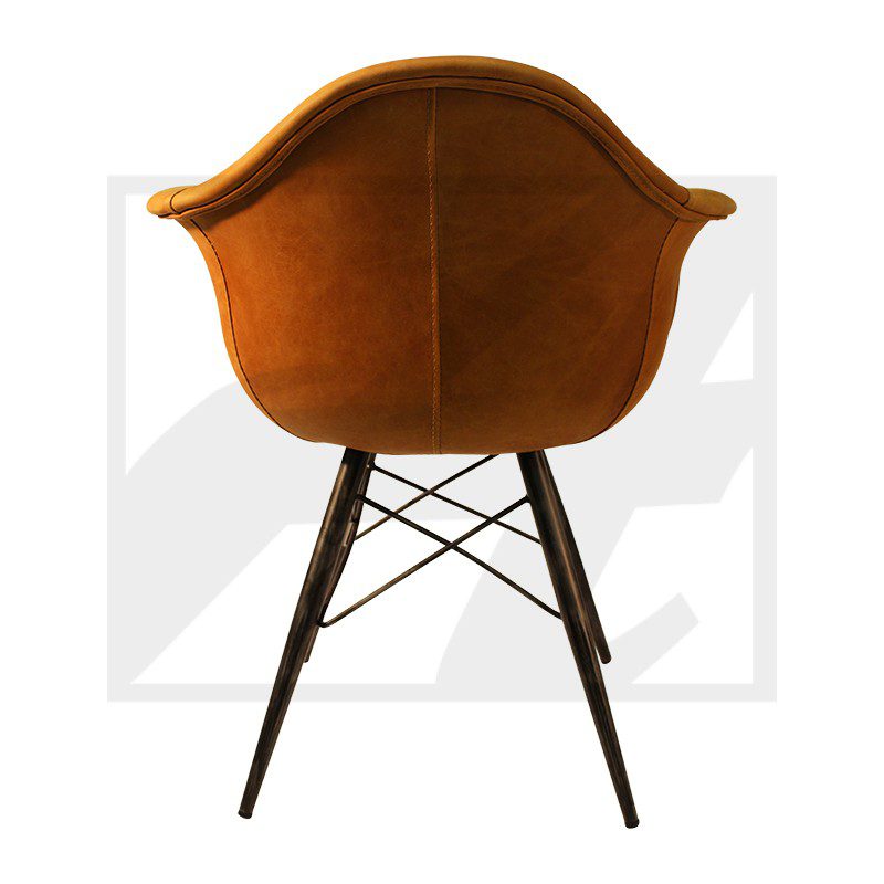 Mid-century modern brown armchair with wooden legs and a curved backrest.