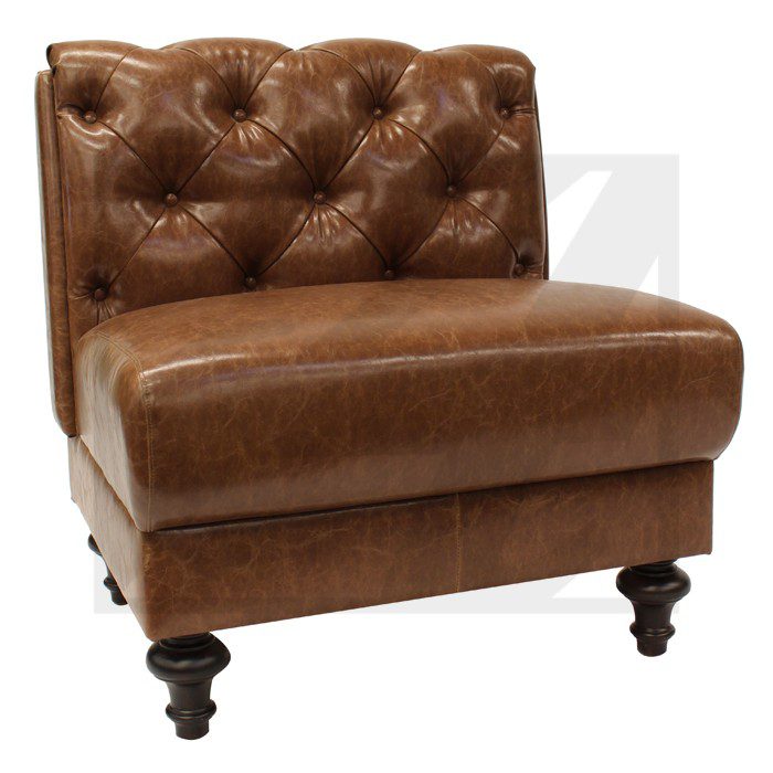 Brown leather tufted armless accent chair with wooden legs.