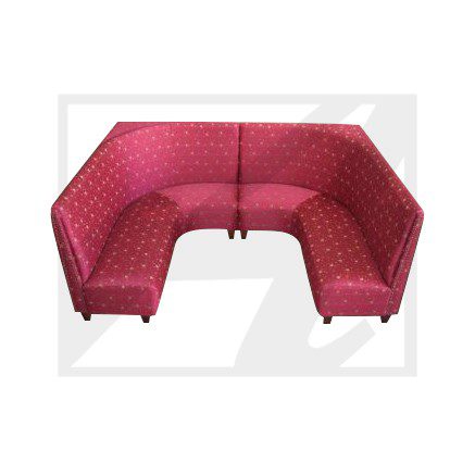 Red fabric sectional sofa with a hexagonal shape.