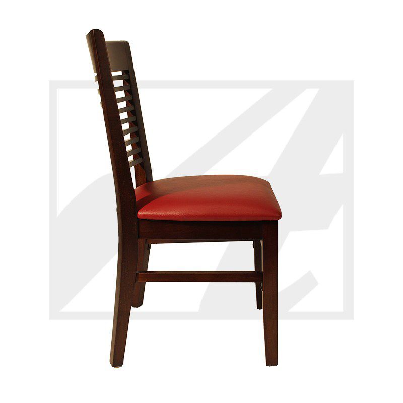 Side view of a wooden chair with a red cushioned seat.