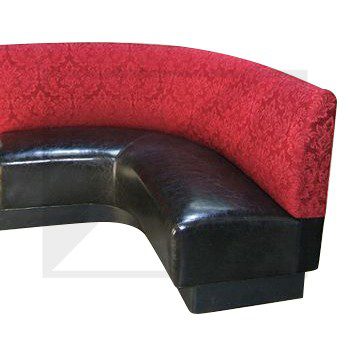 Curved sectional sofa with red fabric backrest and black leather seat.