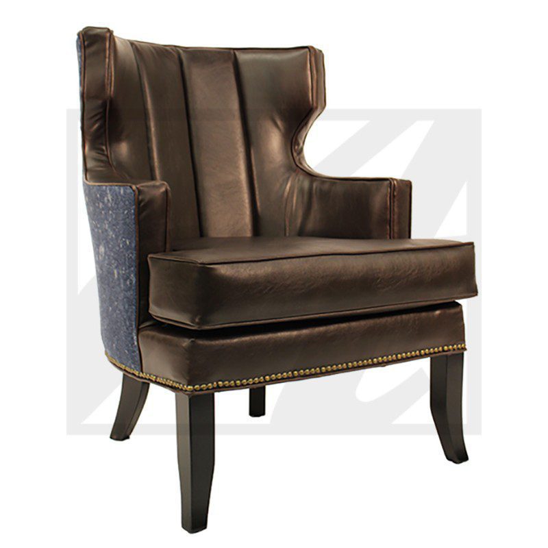 Elegant brown velvet armchair with dark wooden legs.