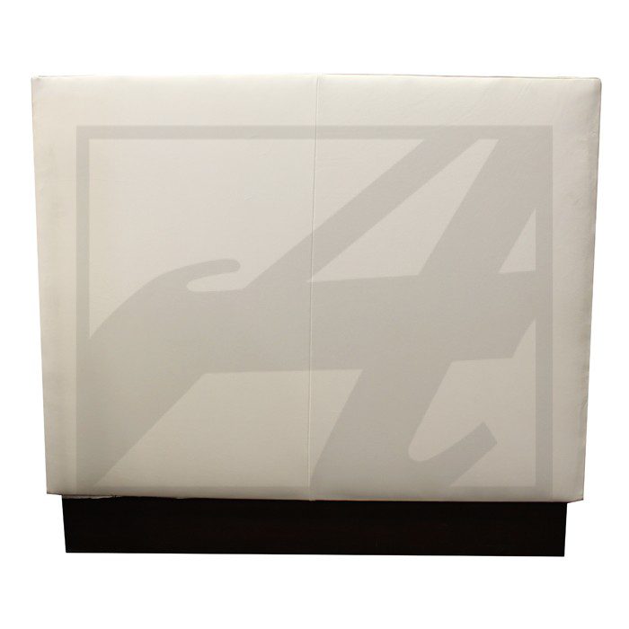 White fabric backdrop with faint 'A' design on a black base.