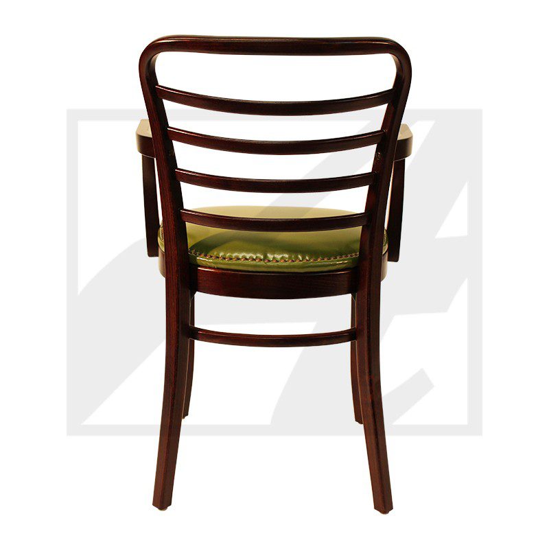 A wooden chair with a green cushioned seat, viewed from the back.