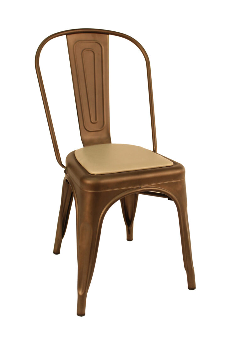 Rust-colored metal chair with a padded beige seat cushion.