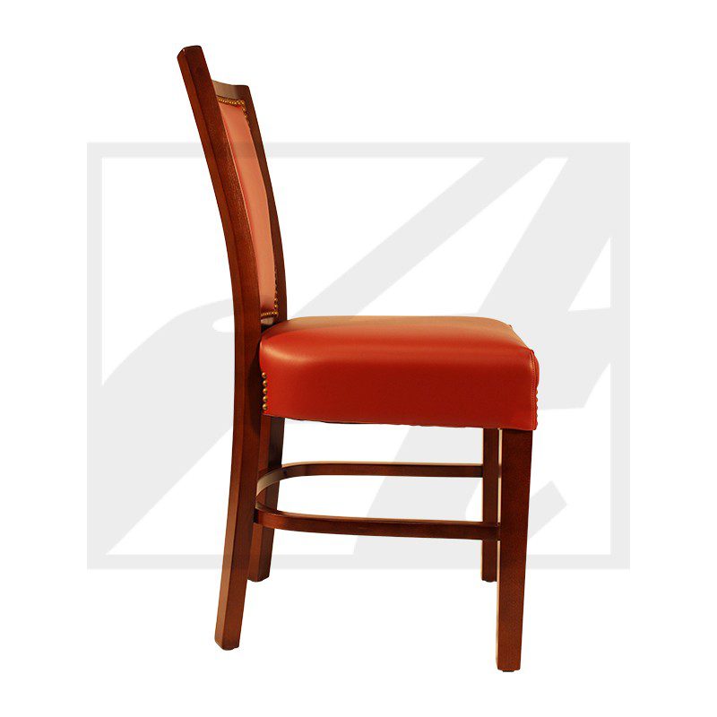 Side view of a wooden chair with a red cushioned seat and backrest.