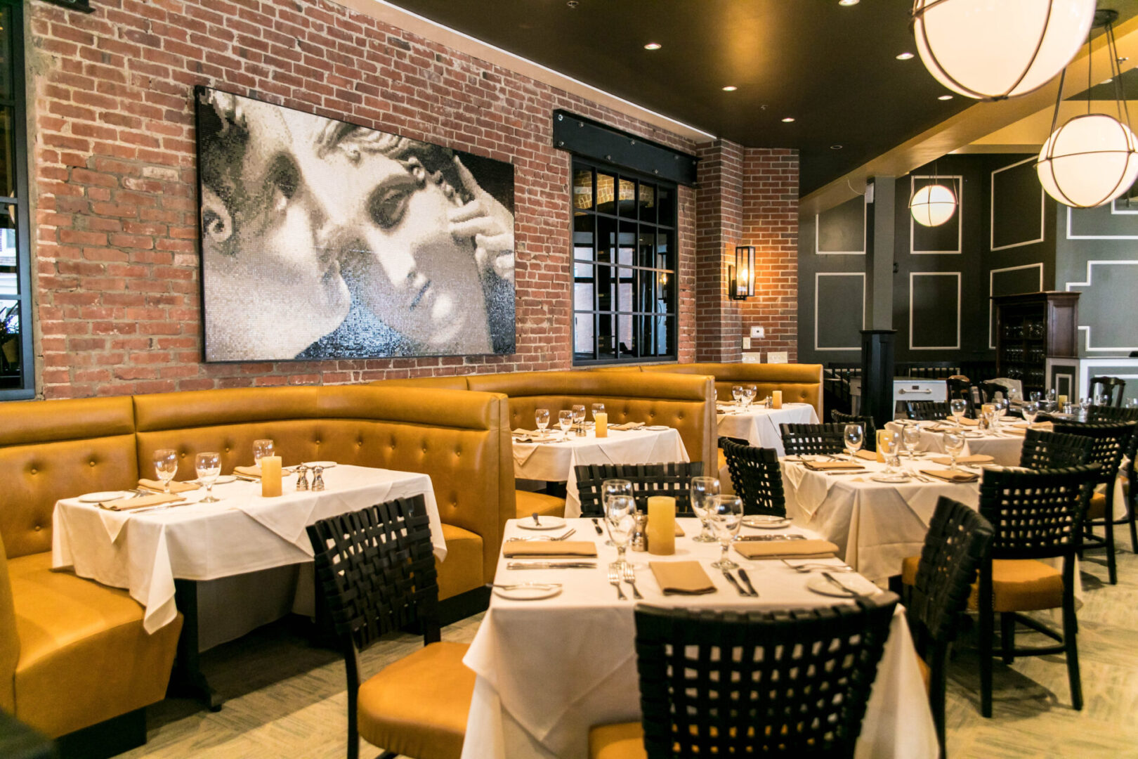Elegant restaurant interior with cozy seating and stylish decor.
