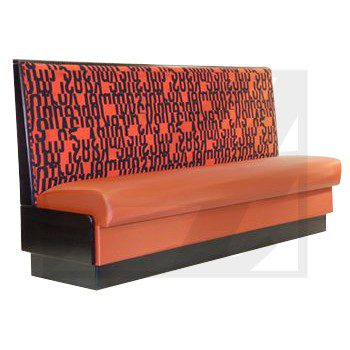 Modern orange restaurant booth with patterned backrest.