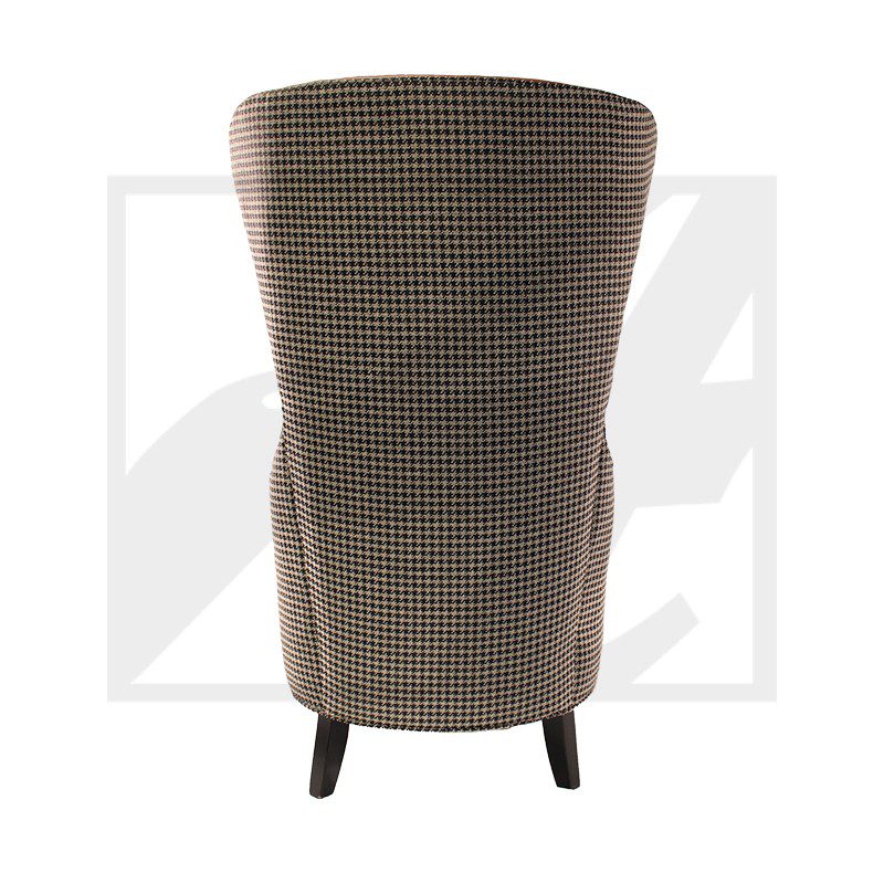 Rear view of a high-back upholstered chair with wooden legs.