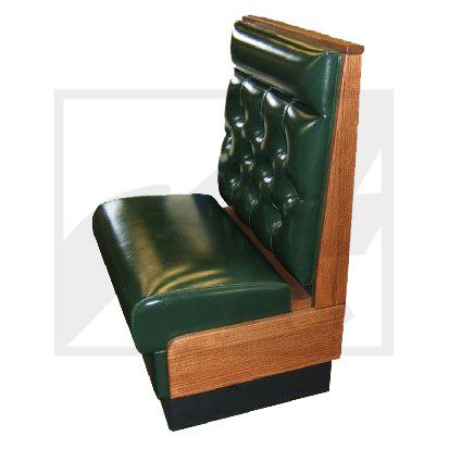 Green leather diner booth seat with wooden frame and tufted backrest.
