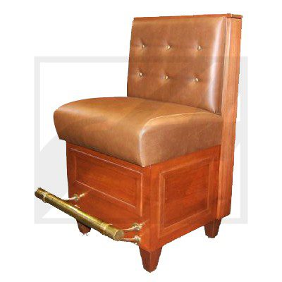 Vintage leather and wood chair with brass footrest.