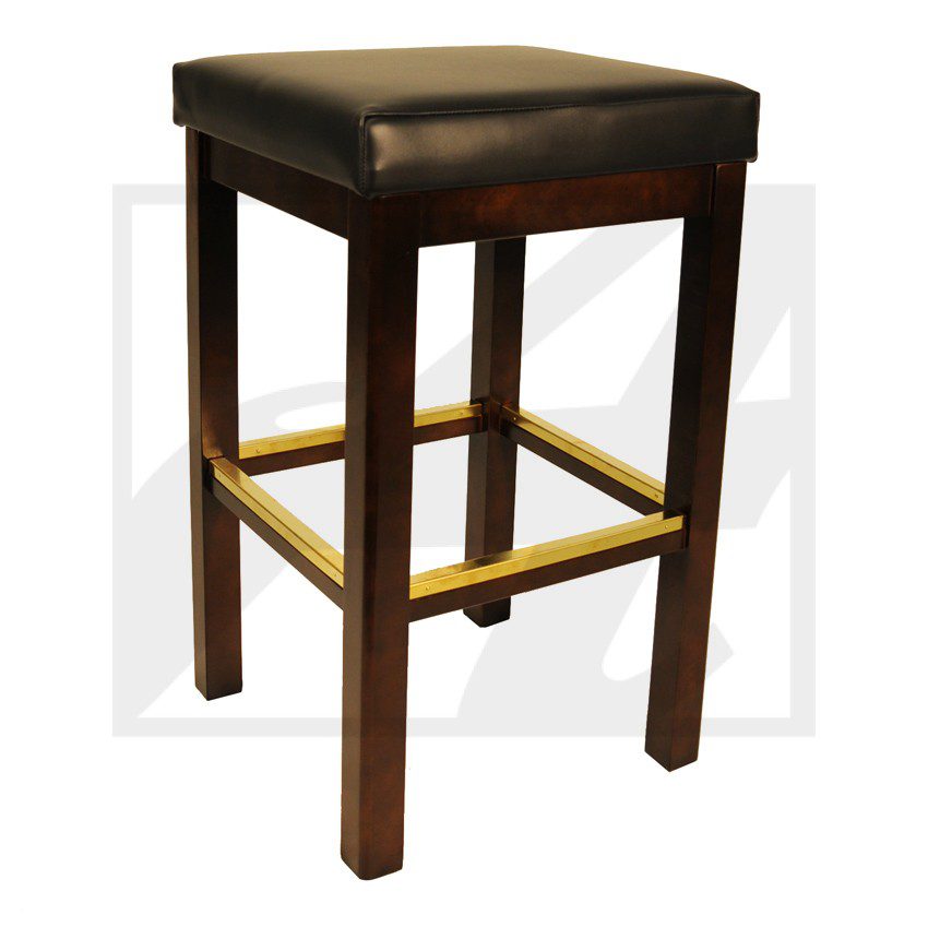Wooden bar stool with a cushioned brown seat and brass footrest.