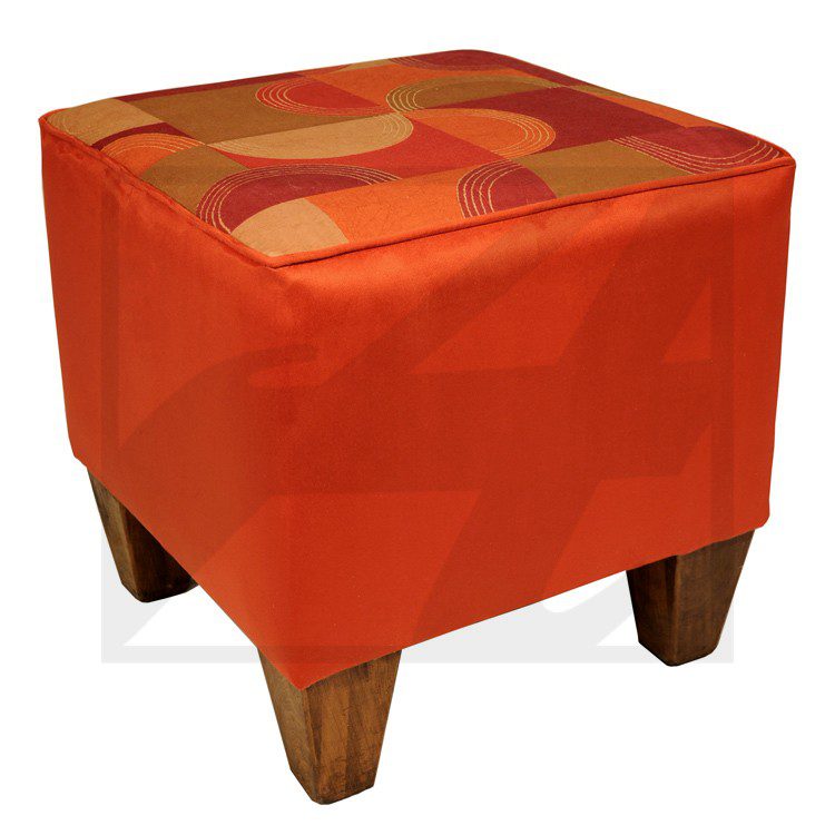 Modern orange ottoman with wooden legs and patterned top.