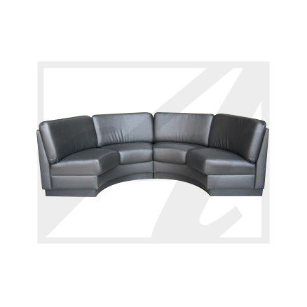 Modern curved sectional sofa with black cushions and gray base.