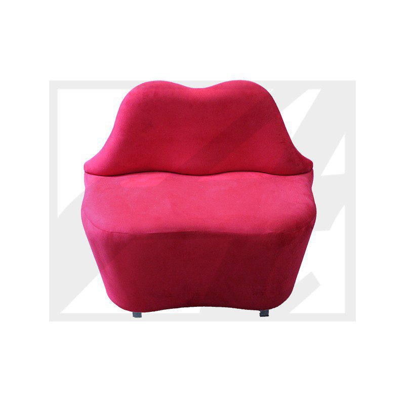 Red lips-shaped couch with a modern design.