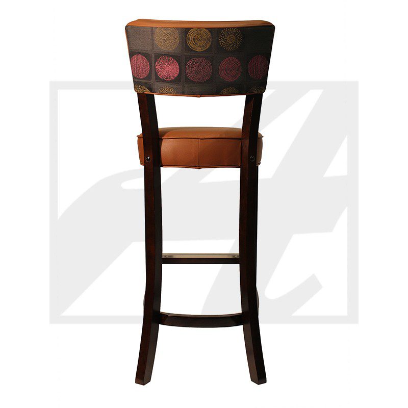 Wooden bar stool with patterned cushioned backrest and seat.