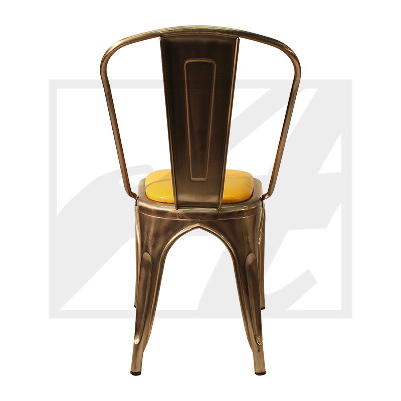 Metal chair with a yellow seat cushion and curved backrest.