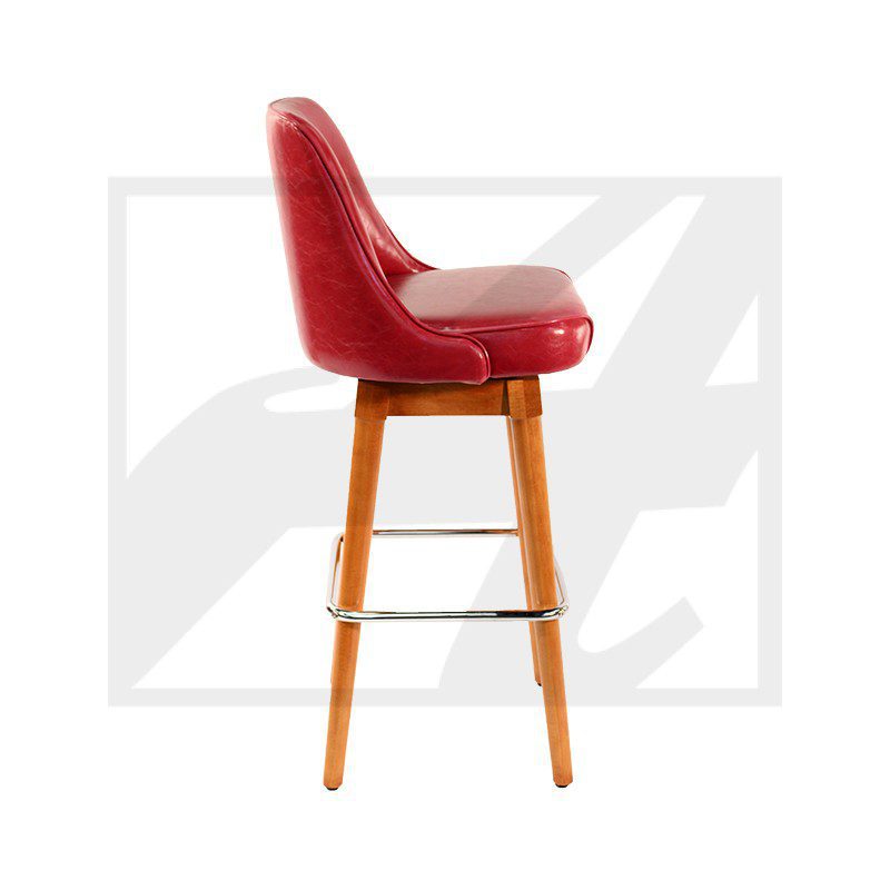 Modern red bar stool with wooden legs and footrest.