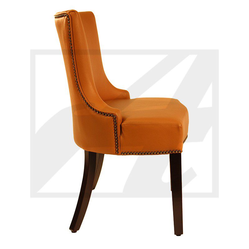Elegant orange upholstered chair with wooden legs.