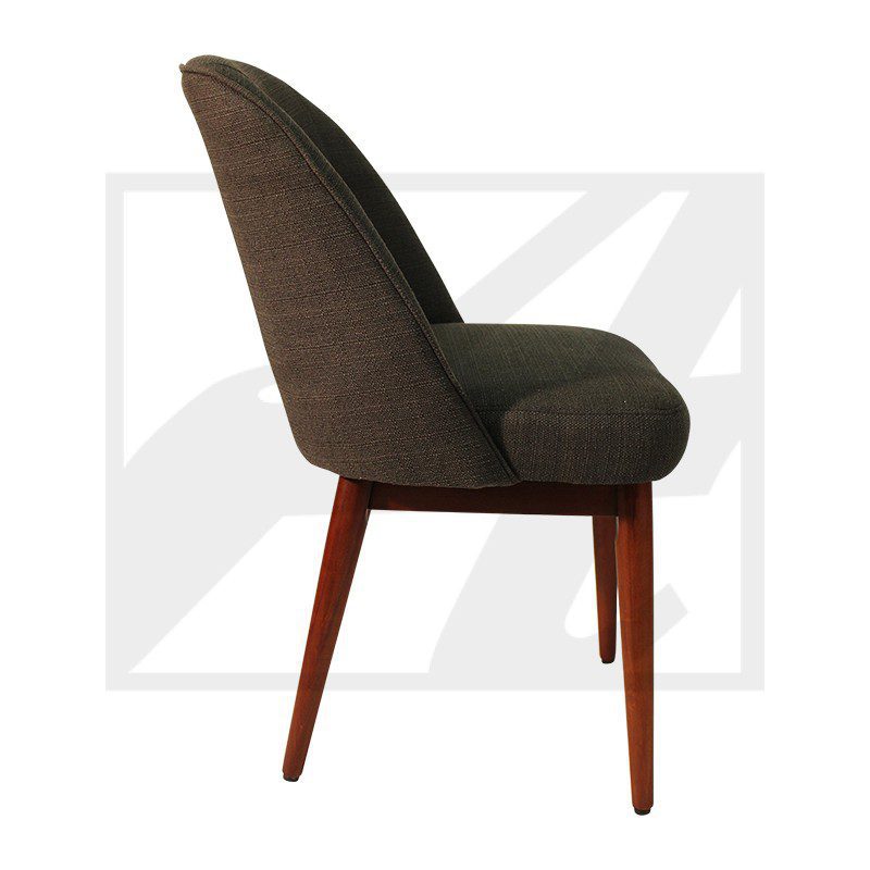 Side view of a modern upholstered chair with wooden legs.
