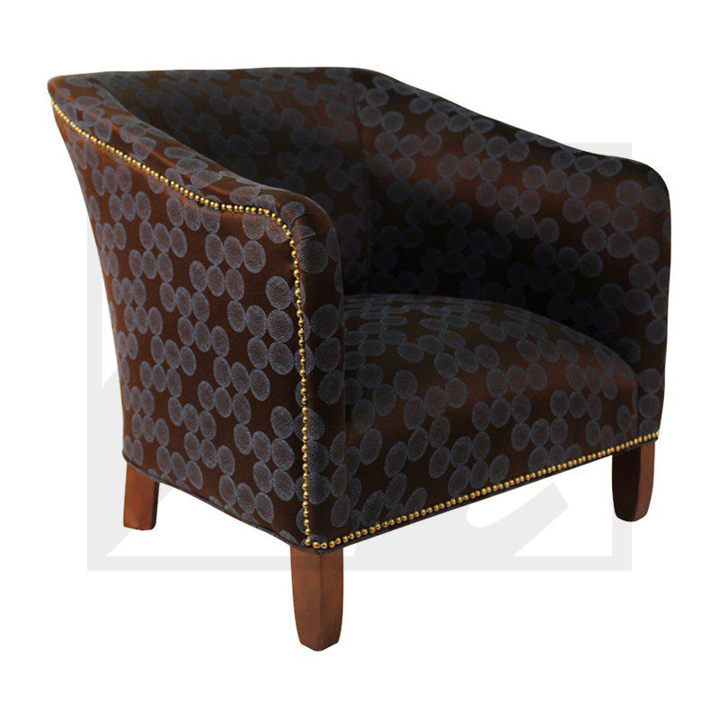 Elegant dark patterned armchair with wooden legs.
