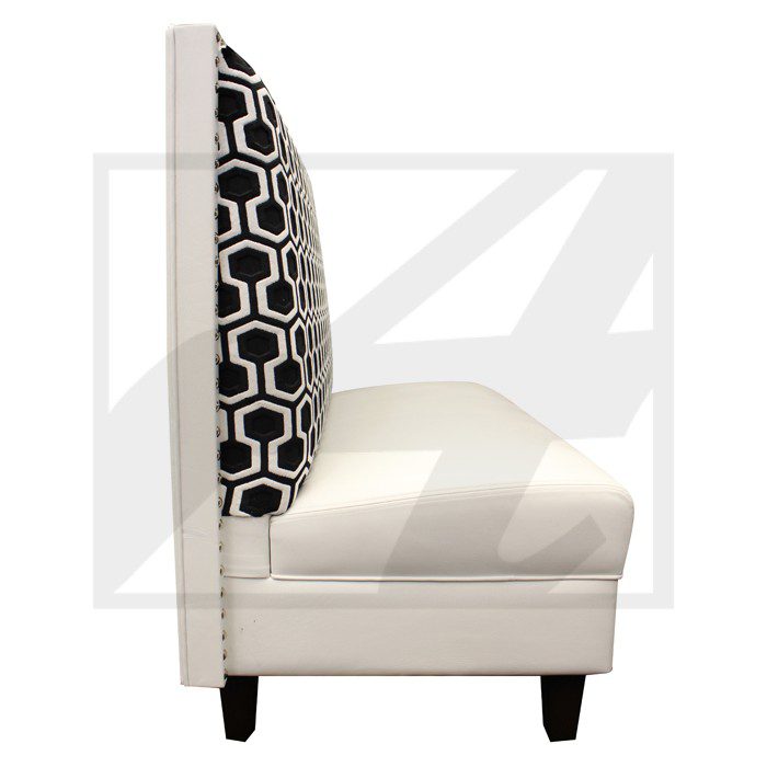 Elegant white accent chair with patterned backrest and dark wooden legs.